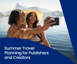 Two female creators in a tropical location take a photo next to the water during summer vacation.